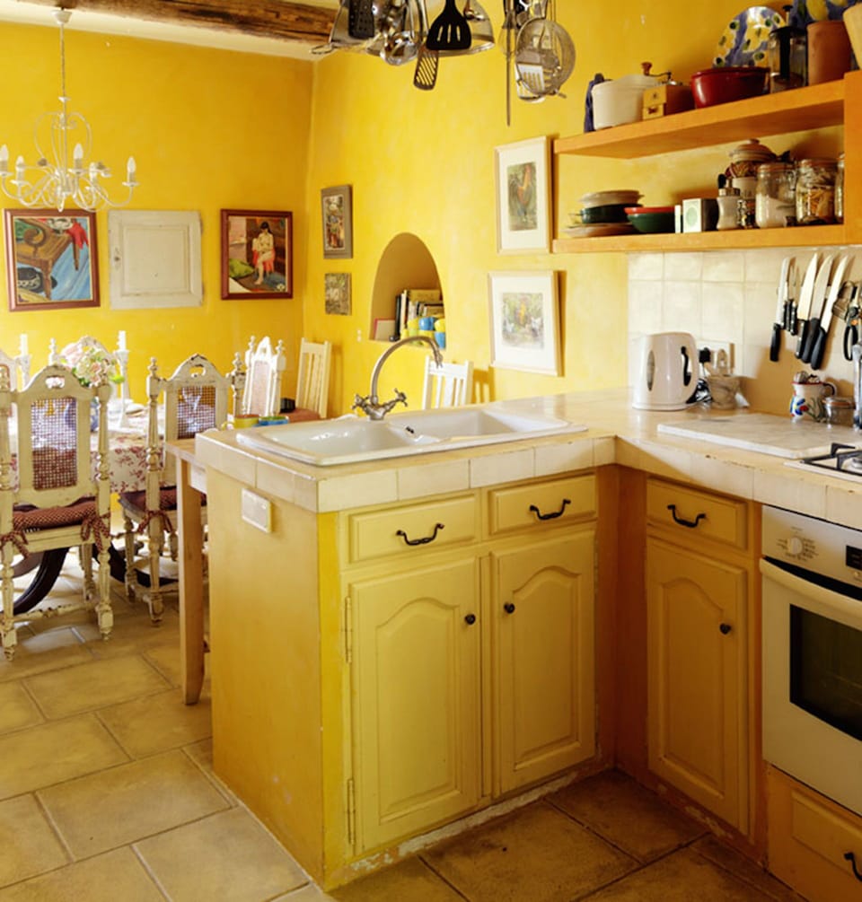 The kitchen has a double sink and is well equipped for the home cook.