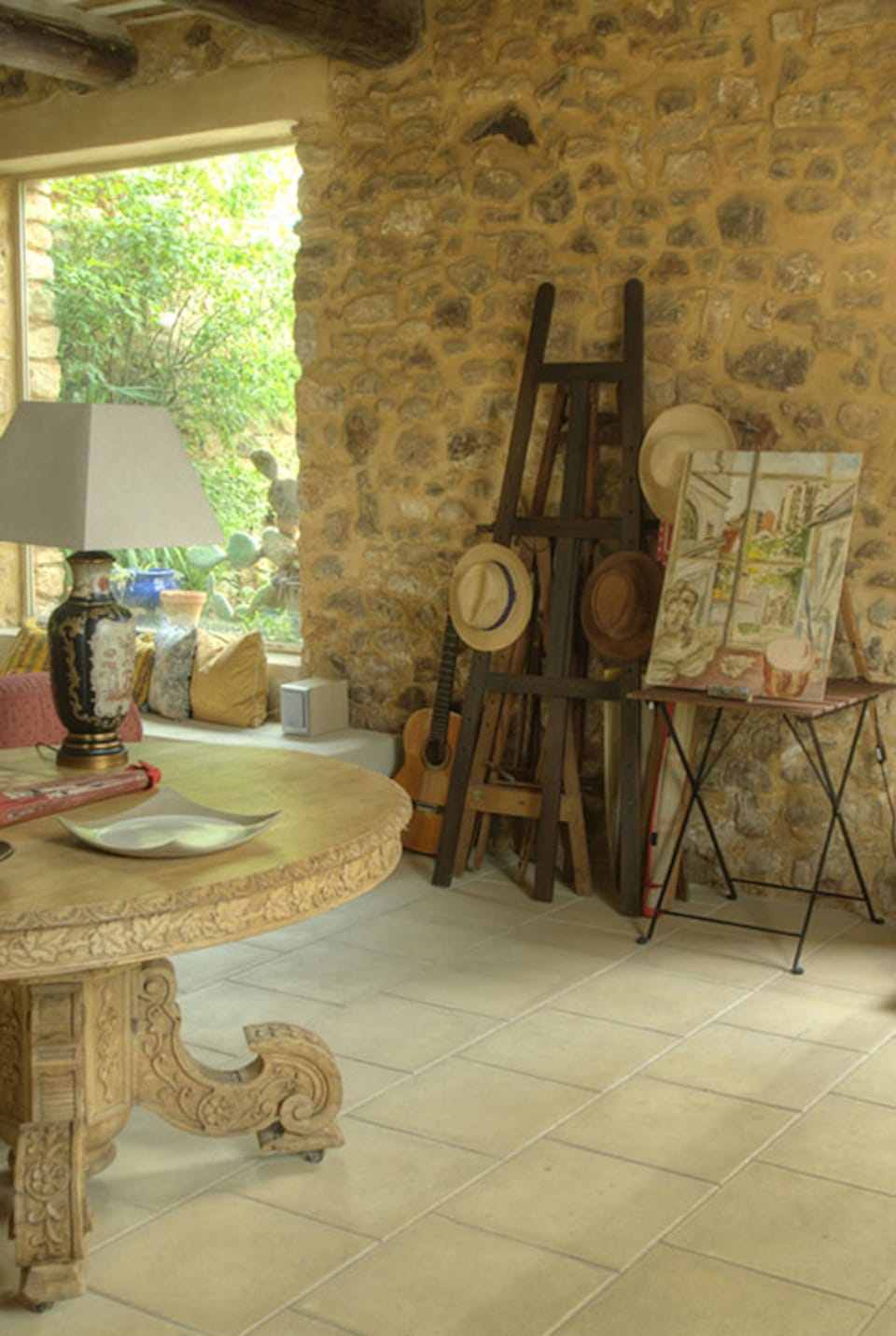 The salon has a collection of artist easels. 