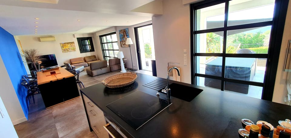 Kitchen with living room at the back
