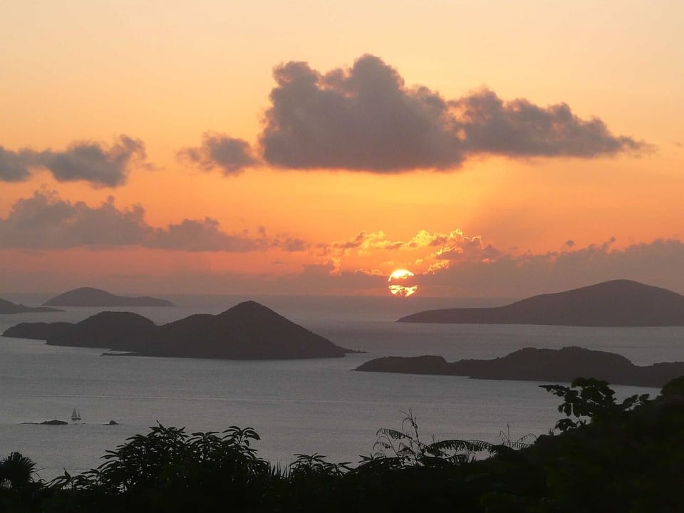 Sunset at the summer solstice, between Thatch Cay and Great Hans Lollik