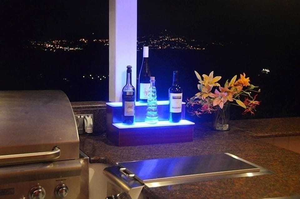 The illuminated bar slowly cycles through a palette of colors