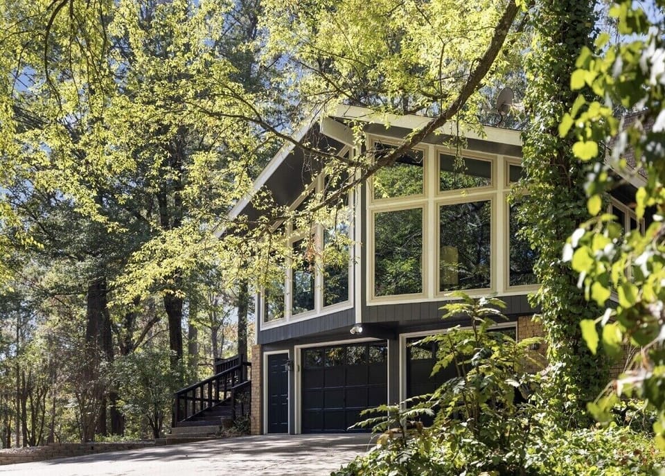 Hilltop Lodge / Front Entry Way / Concrete Parking Pad.