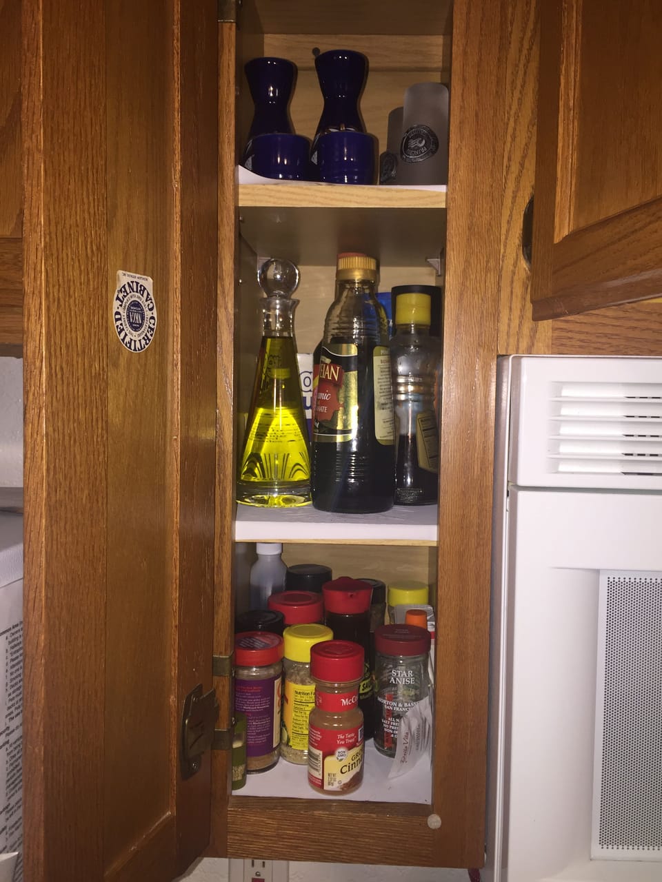 Sake glasses, shot glasses, oil, vinegar, teriyaki, soy sausage, spices.