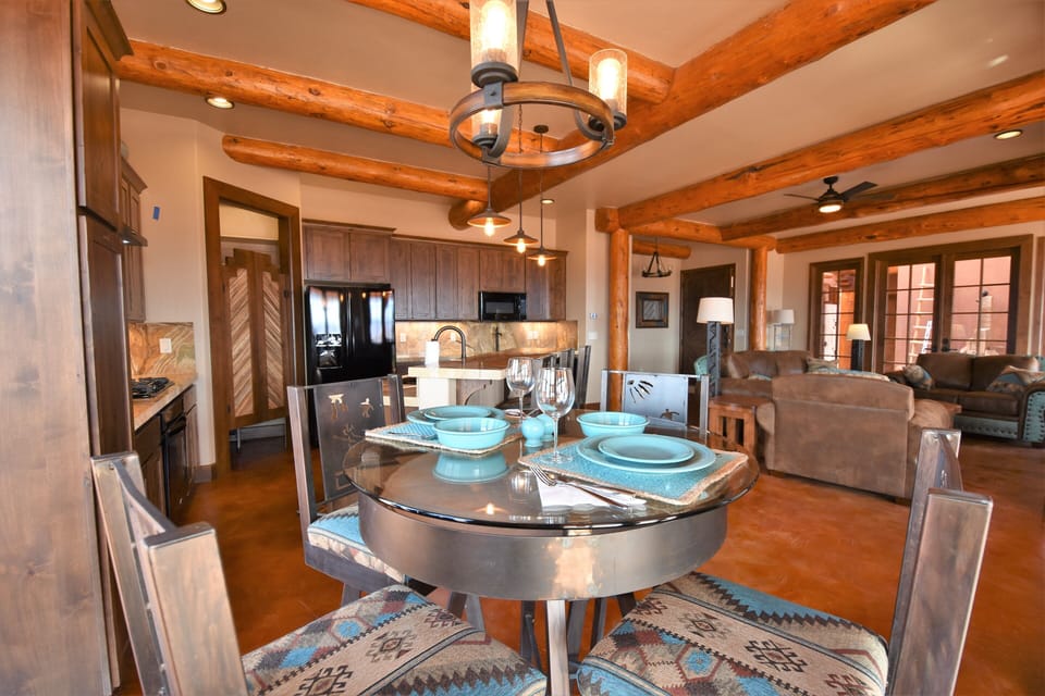 Raised Bistro table with seating for 4 and 3 more at the raised bar.