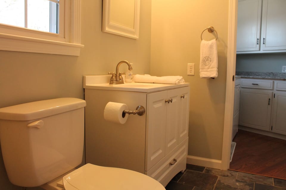 connecting bathroom with bedroom 2 upstairs that has a full shower & hall access