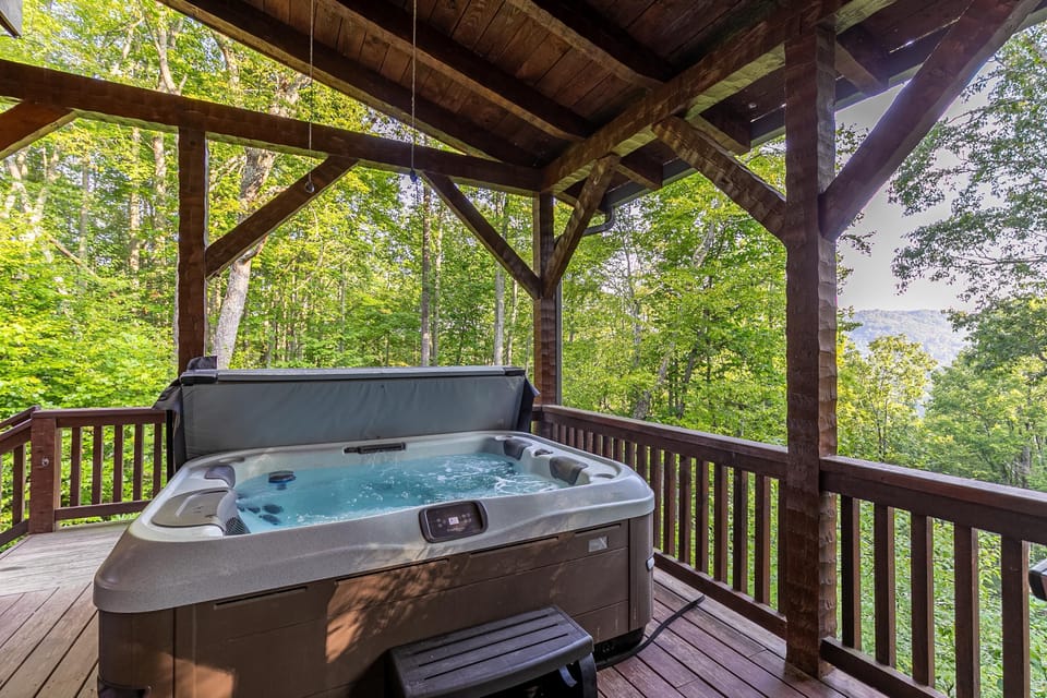 Soak in the bubbling hot tub while the Blue Ridge trees and mountain ridges stretch out all around you.