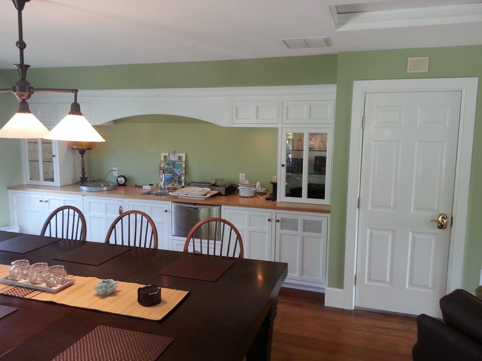 Dining Room, Wet Bar, Sound System - back finished entryway, custom blinds