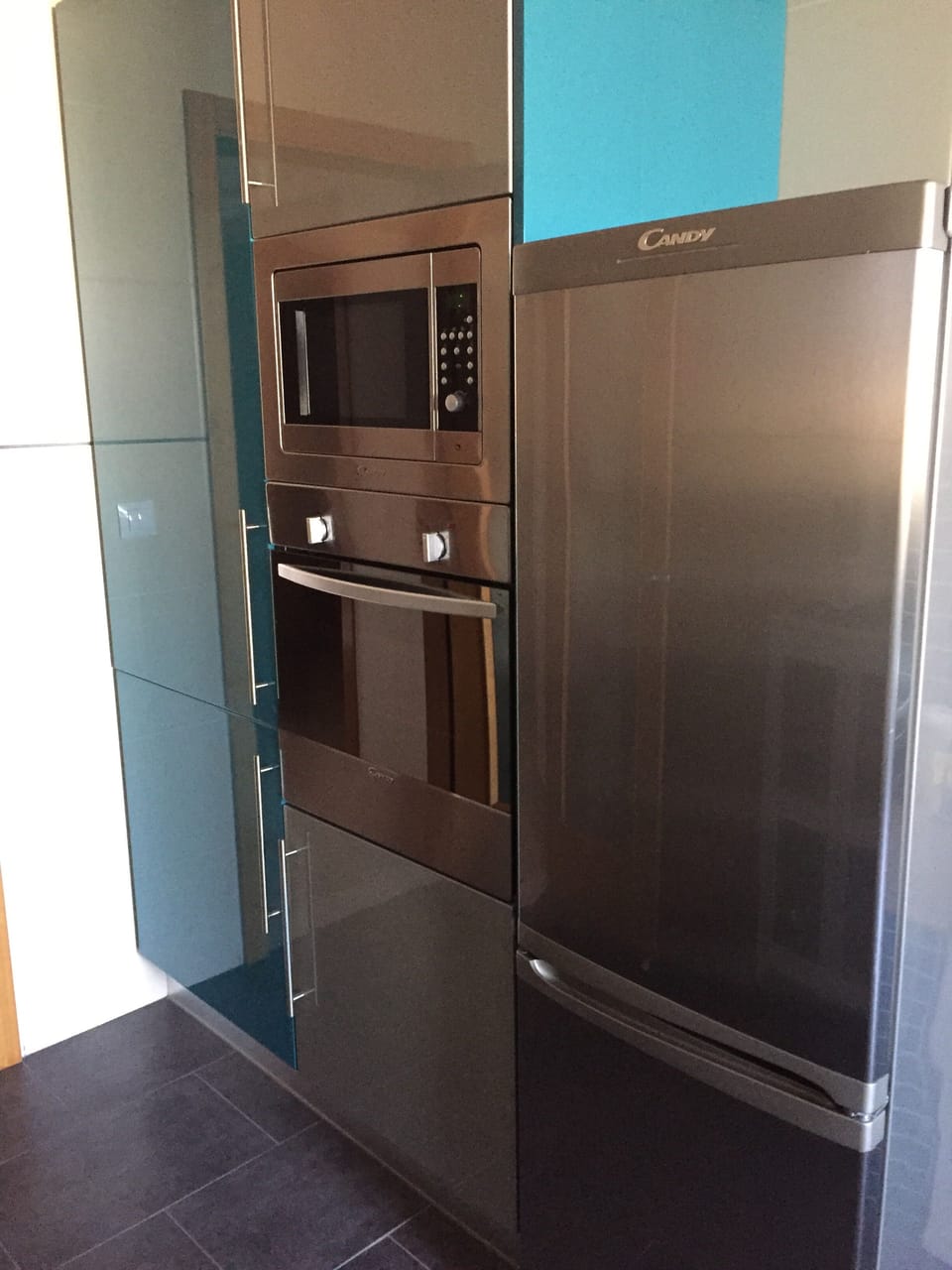 Freezer, refrigerator, oven and pantry in the kitchen