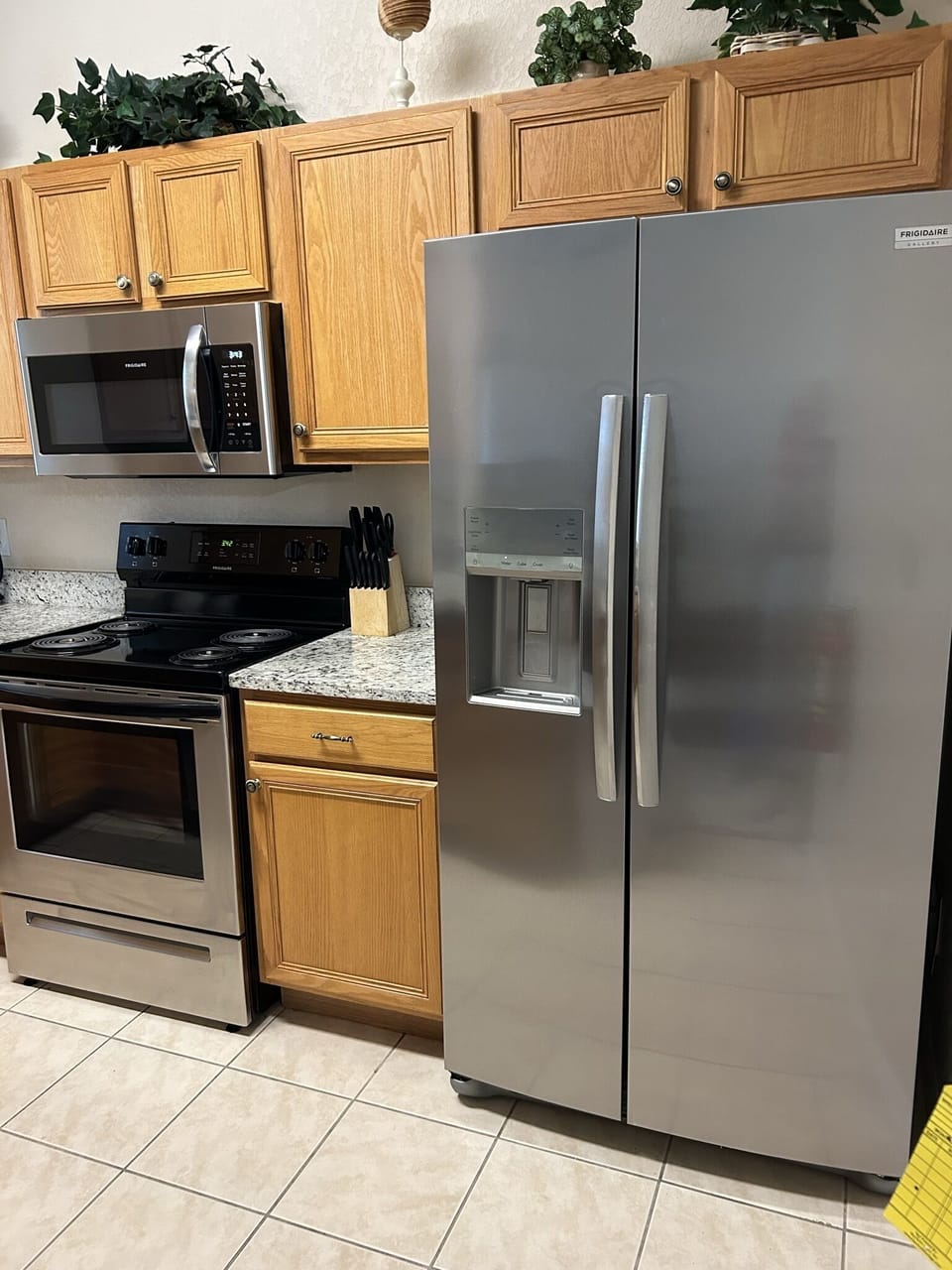 granite kitchen top and new fridge freezer with ice maker and water tap