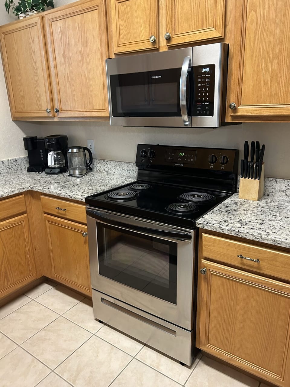 Granite top with new range and microwave
