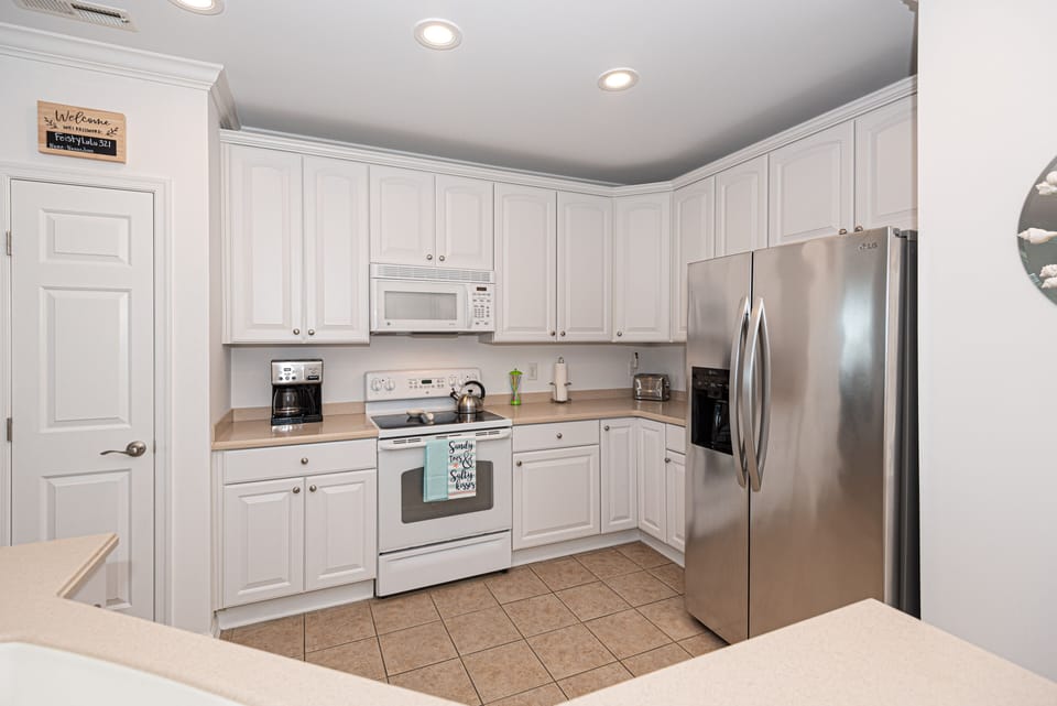  Kitchen area. Kitchen is fully equipped with all appliances/utensils.
