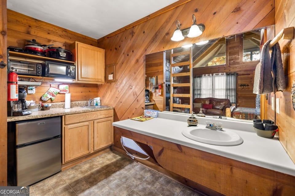 Kitchen area plus bathroom sink area
