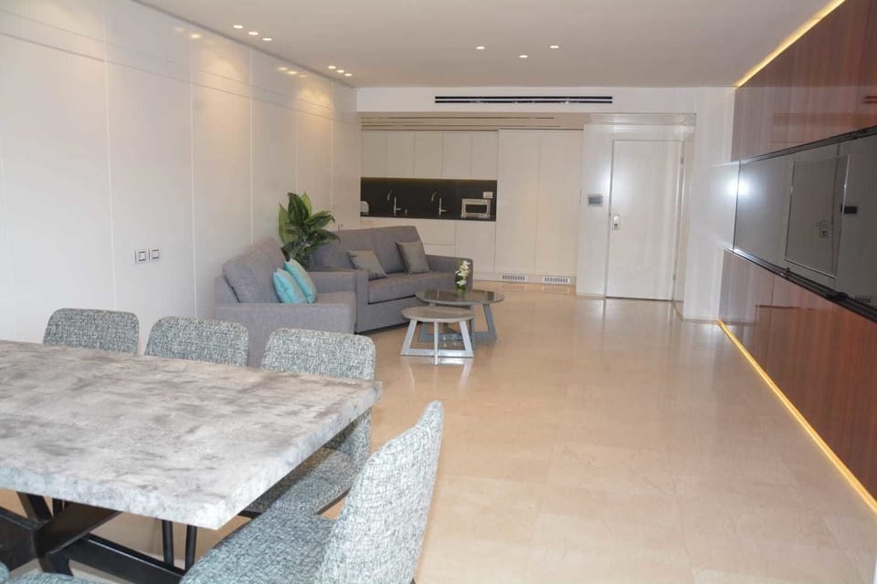 Apartment, 3 Bedrooms | Living area | Flat-screen TV