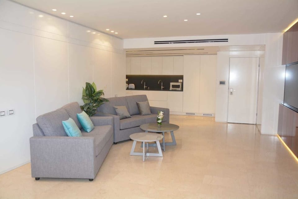 Apartment, 3 Bedrooms | Living area | Flat-screen TV