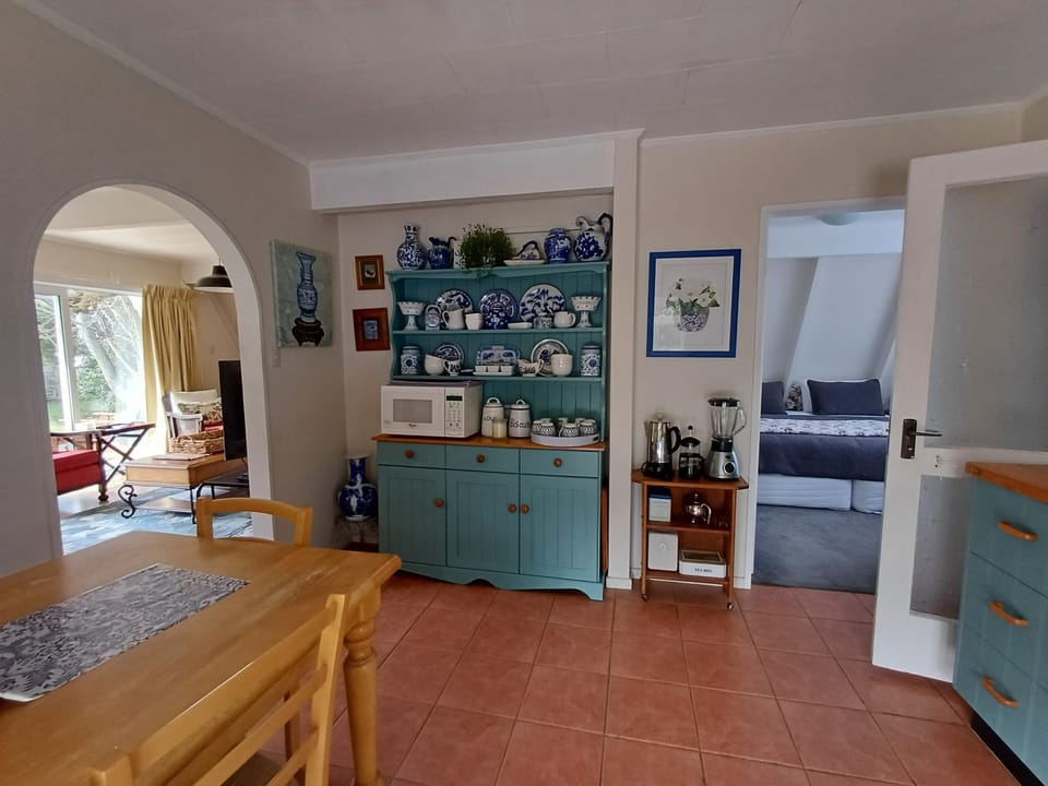  Fully equipped kitchen with seating for 6 leading to large outside patio.