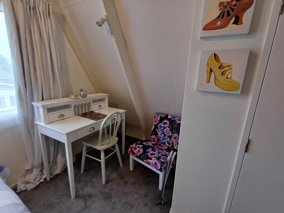 Study area for working from home. 
Storage available in large wardrobe.