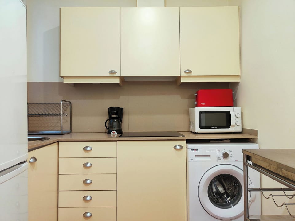 Kitchen with all essentials plus washing machine
