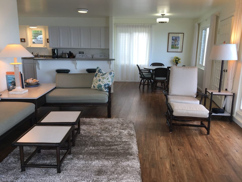 Relax in this lovely living room where you can sit an see the ocean just beyond