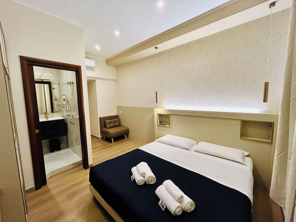 Deluxe Double or Twin Room (Domiziana) | In-room safe, desk, iron/ironing board, free WiFi
