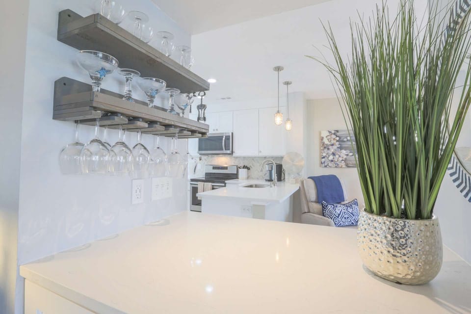 This is the view of the kitchen and living room from the central hallway.