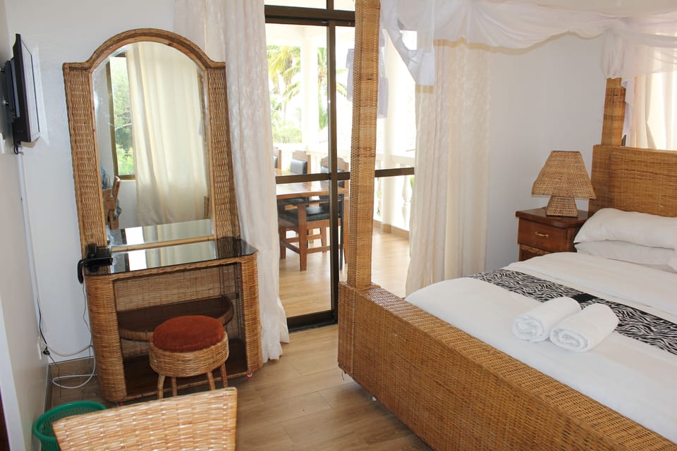 Family Suite, 2 Bedrooms, Balcony, Ocean View | In-room safe, free WiFi, bed sheets