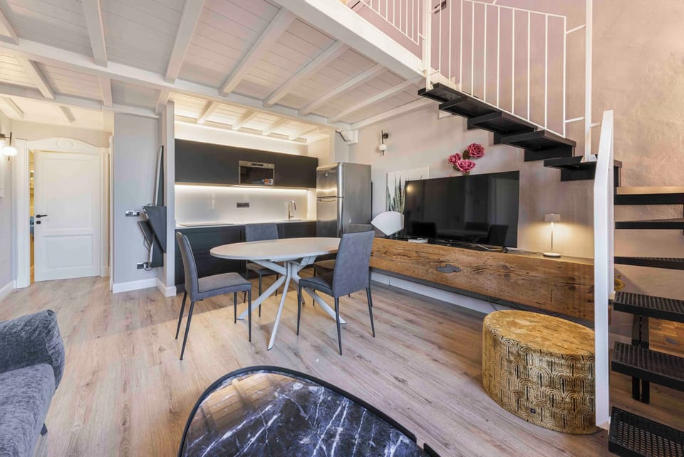 Apartment, 4 Bedrooms | Living area | Flat-screen TV