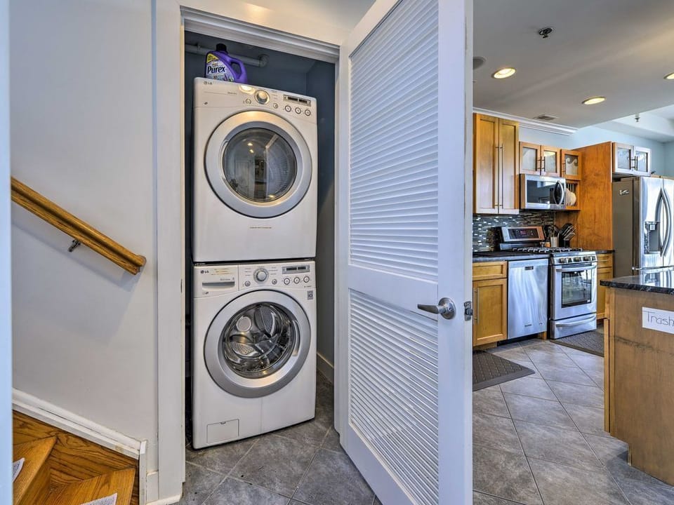 Laundry Closet by Entry and Staircase