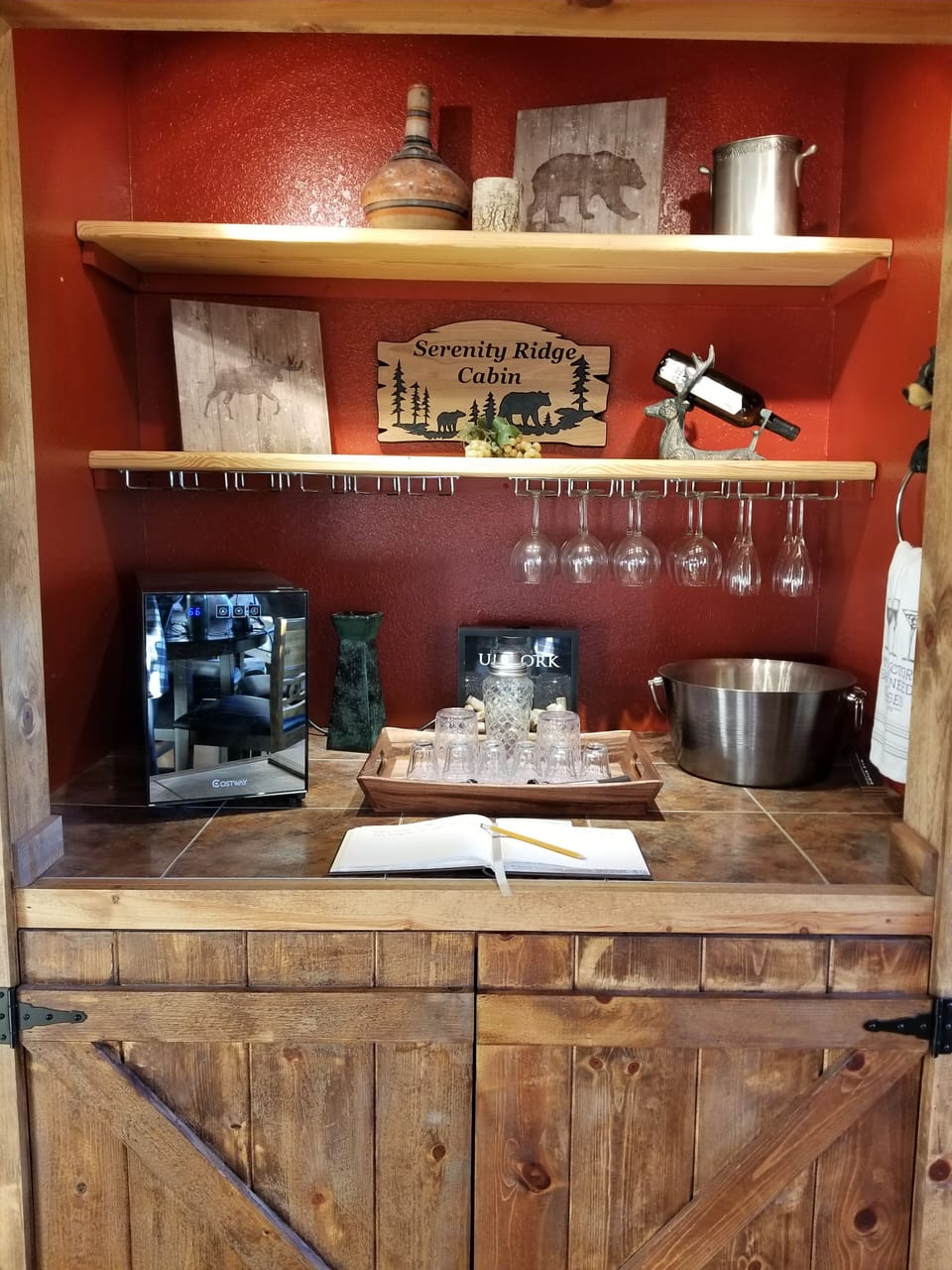 Oh yeah, the bar comes complete with a wine refrigerator.