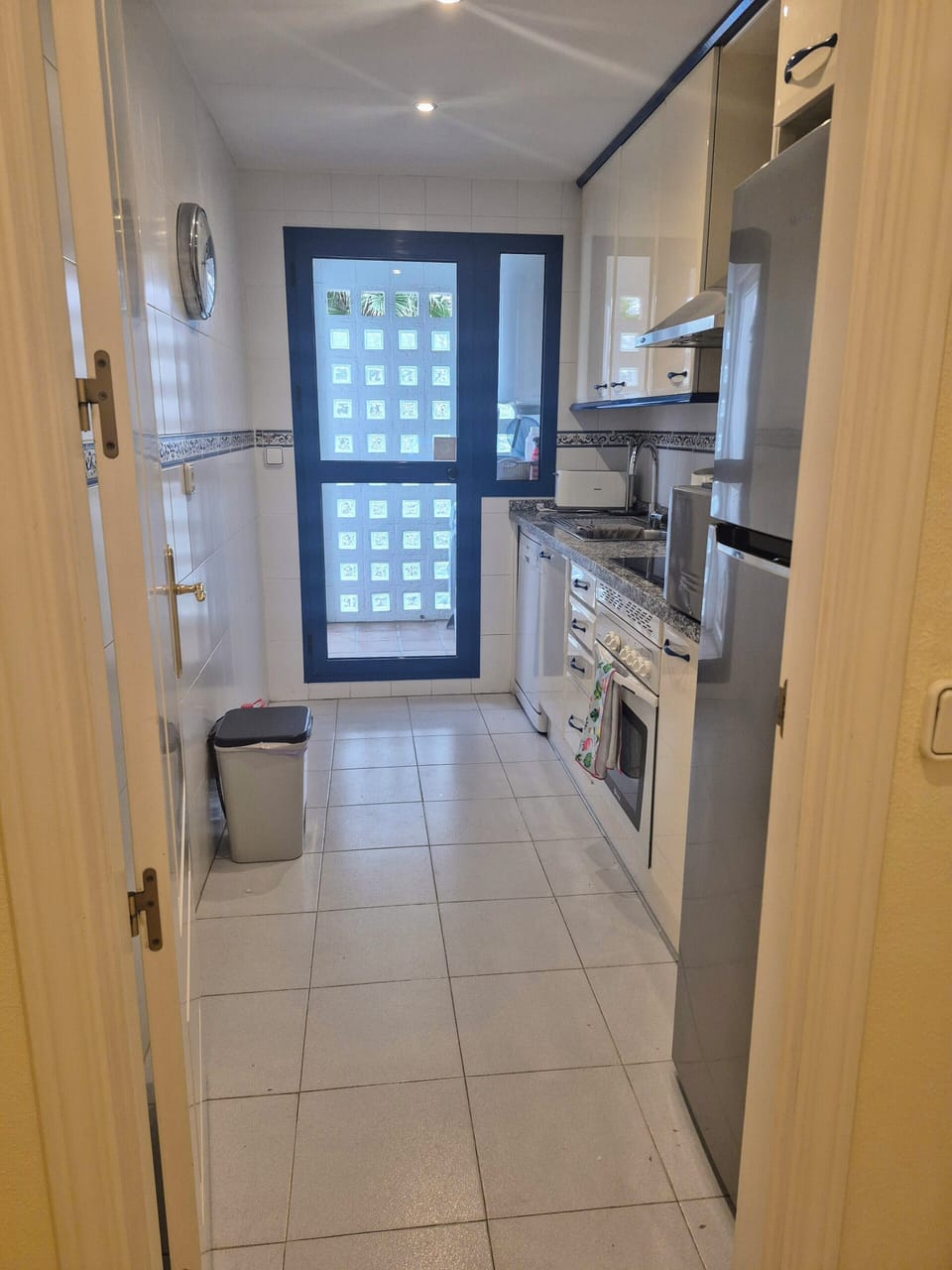 Kitchen with induction hob, oven, microwave, dishwasher & fridge freezer