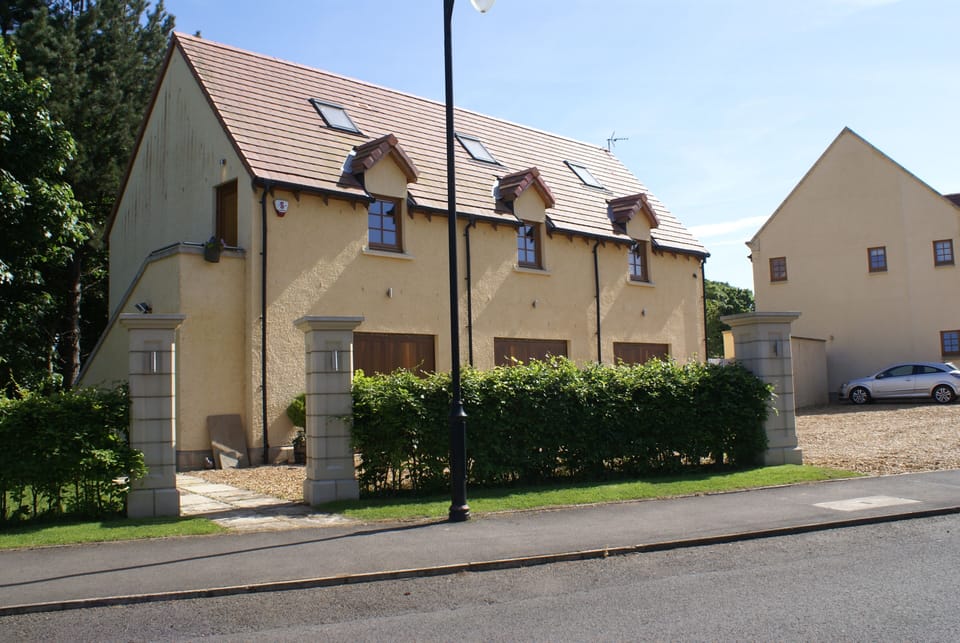 The property is accessed by an external staircase.