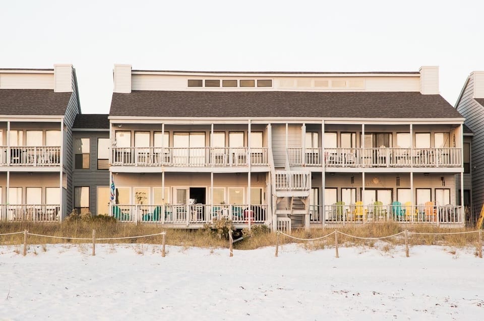 Condo is on ground level - this is deck view from the gulf #4 has the flag


