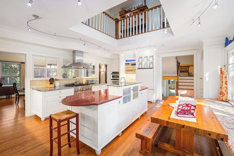 Large kitchen.  Bay window seat at right.  Table seats up to 10.