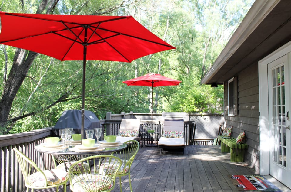 Large upper desk with chaise lounges, benching and patio table & chairs
