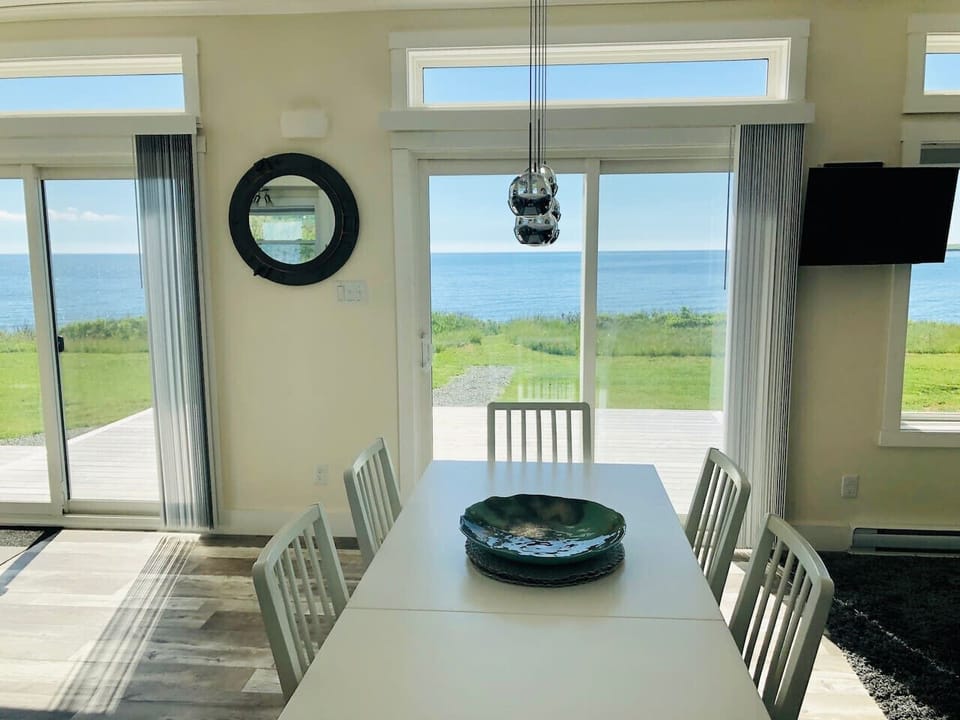 Dining table with ocean view in the background