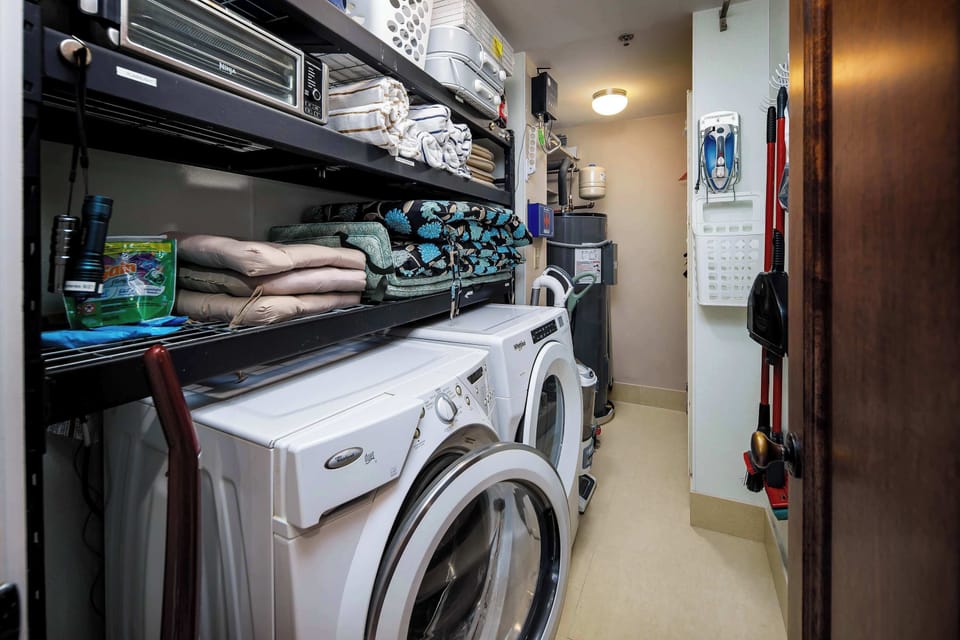 Laundry room with washer and dryer