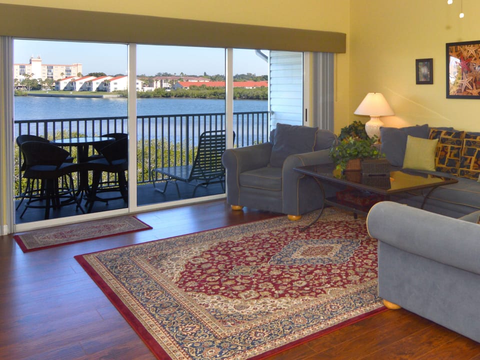 Living Room with unobstructed water views. Dolphin watchers' rejoice!  
