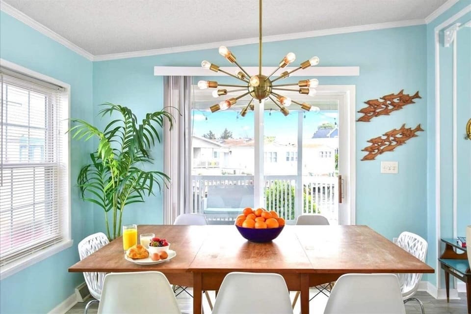 Enjoy sunshine and views of the bay as you gather around the table for meals. Fold down the sides for more room if you want!