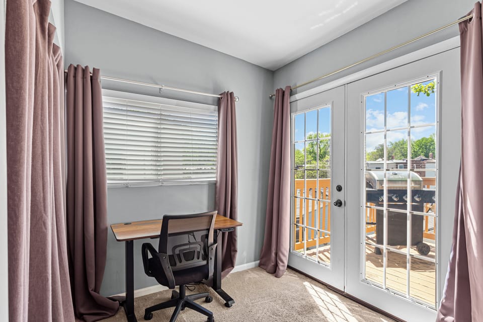 Standing desk w/closet, iron & ironing board. Gas grill right outside your door
