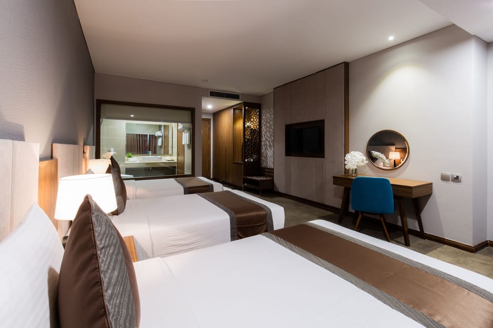 Deluxe Triple Room | Premium bedding, minibar, in-room safe, individually decorated
