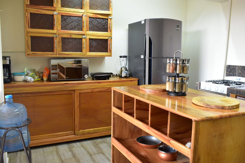 Shared fridge, shared microwave, cookware/dishes/utensils