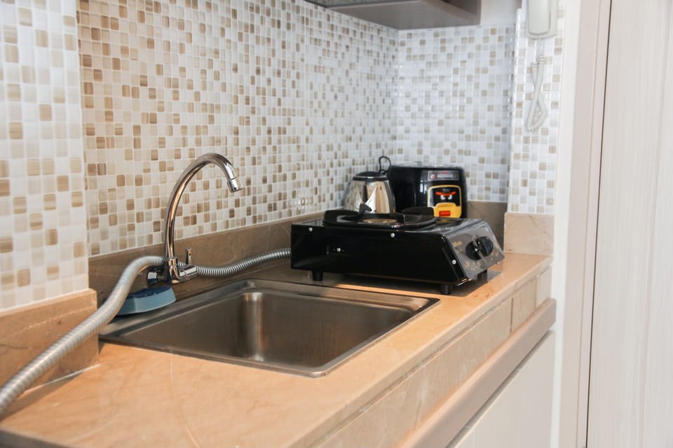 Room | Private kitchenette | Fridge, stovetop, rice cooker, cookware/dishes/utensils