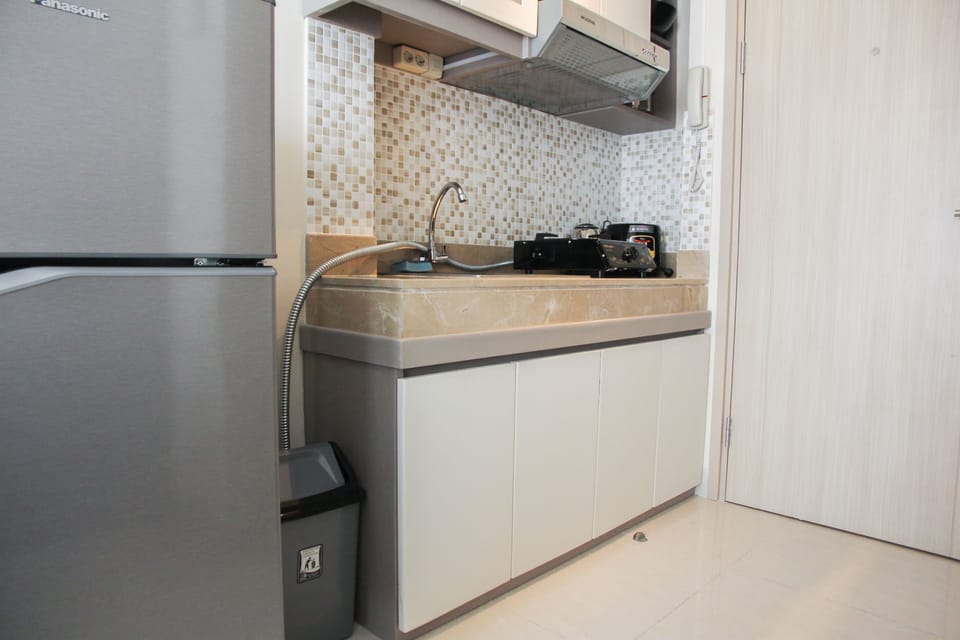 Room | Private kitchenette | Fridge, stovetop, rice cooker, cookware/dishes/utensils