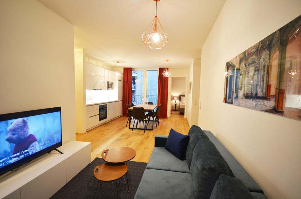 Premium Apartment | Living area | Flat-screen TV