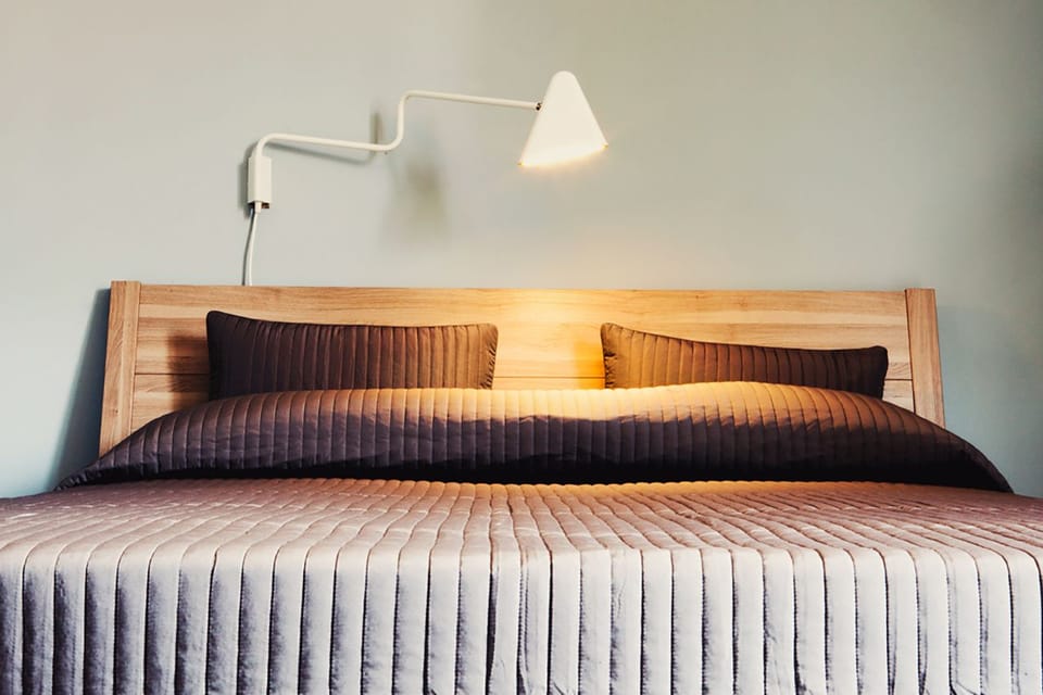 Double Room | Desk, blackout drapes, iron/ironing board, cribs/infant beds