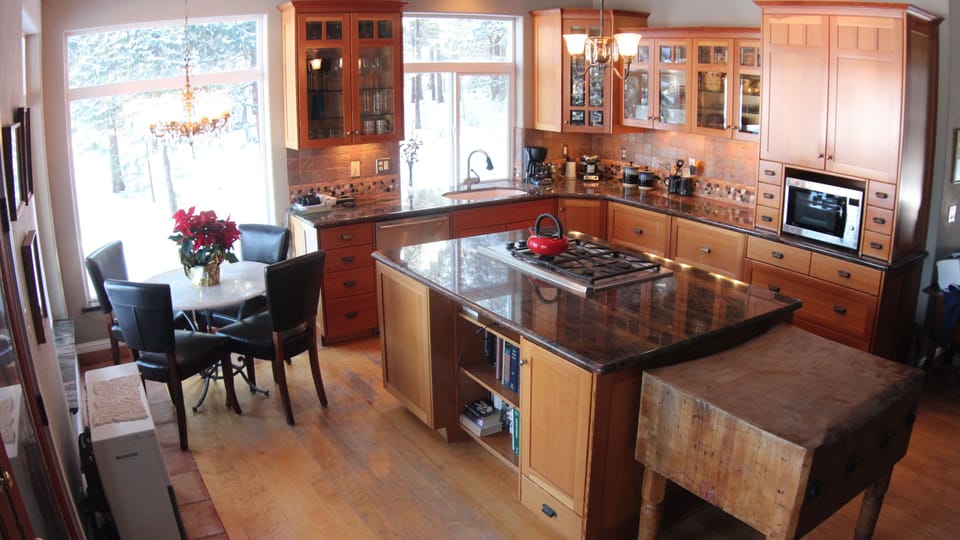 Chef's dream kitchen with fir cabinets, granite, subzero and dacor appliances