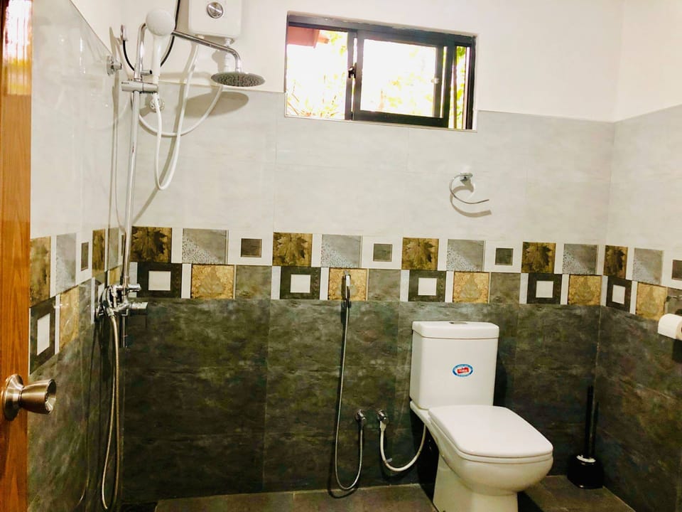 Shower, rainfall showerhead, towels