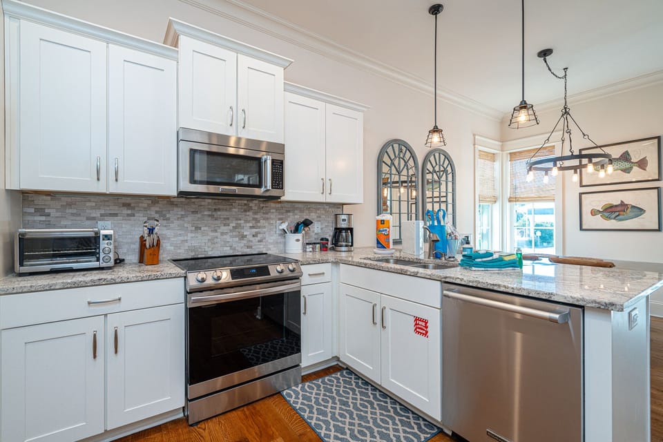 Open floor plan, kitchen open to dining and living room