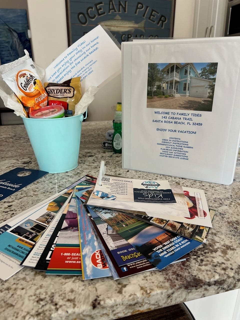A packet of placards w/ fun things to do, &  a binder w/ dining recommendations 