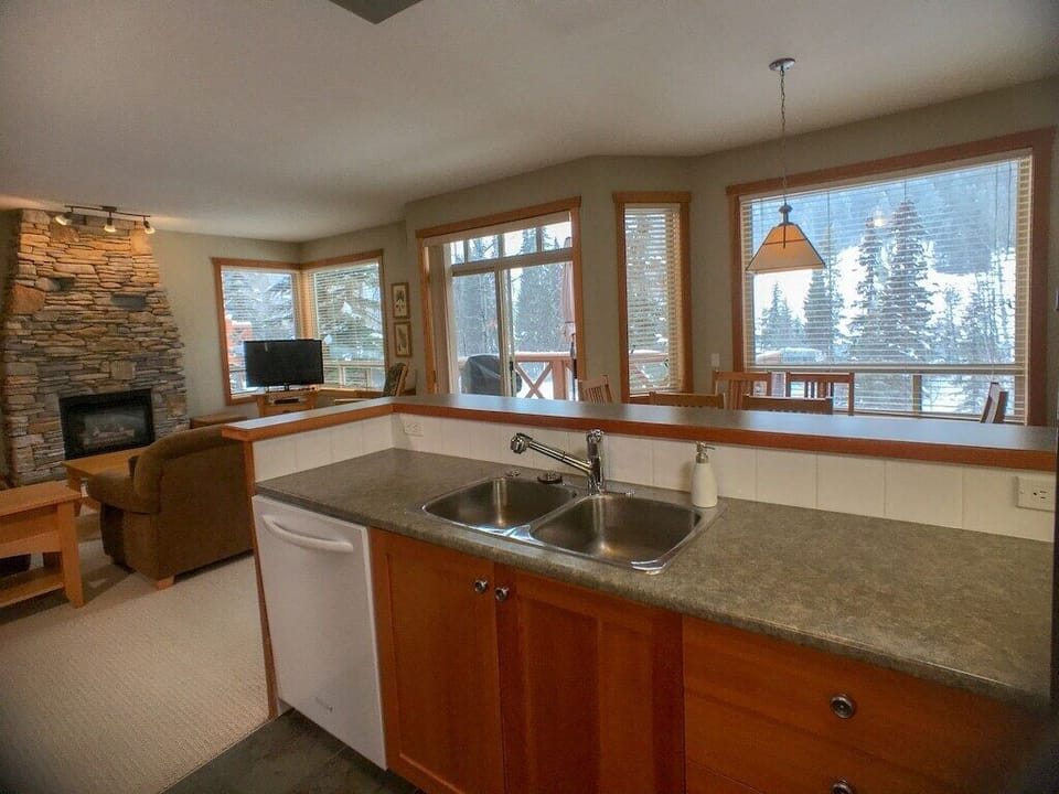 Kitchen - enjoy the view of the horse stables across the wooden bridge