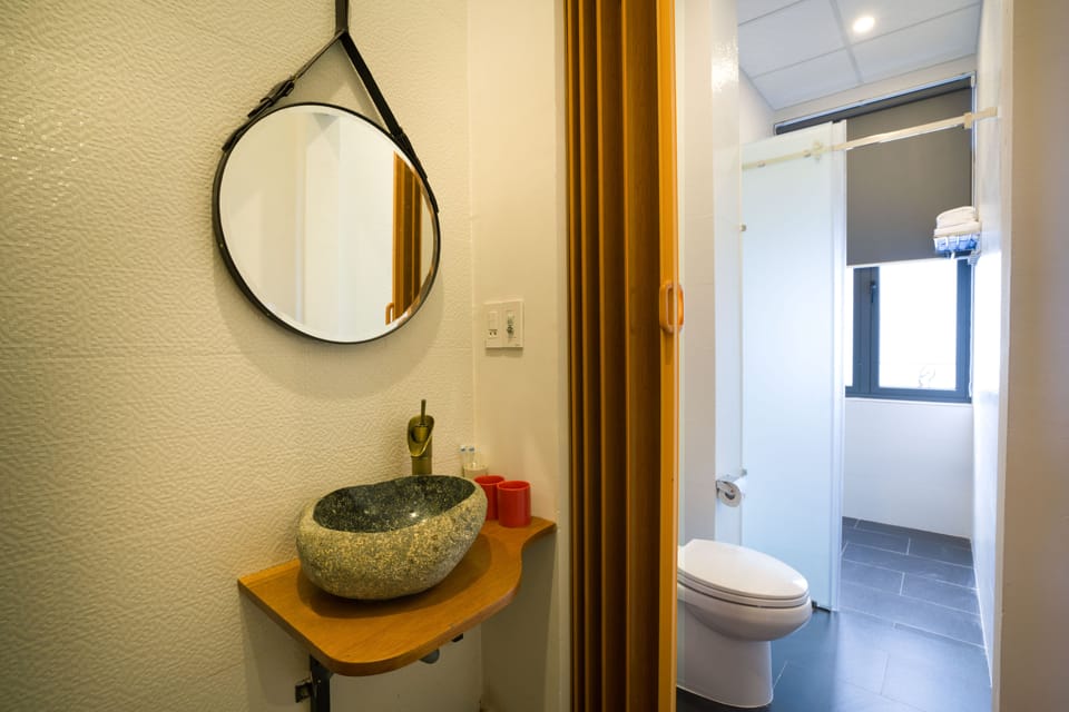 Deluxe Room, Balcony, Garden View | Bathroom | Shower, free toiletries, hair dryer, bathrobes